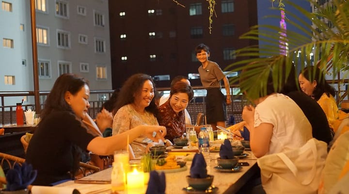 Guests dining at Mít Rooftop Bistro